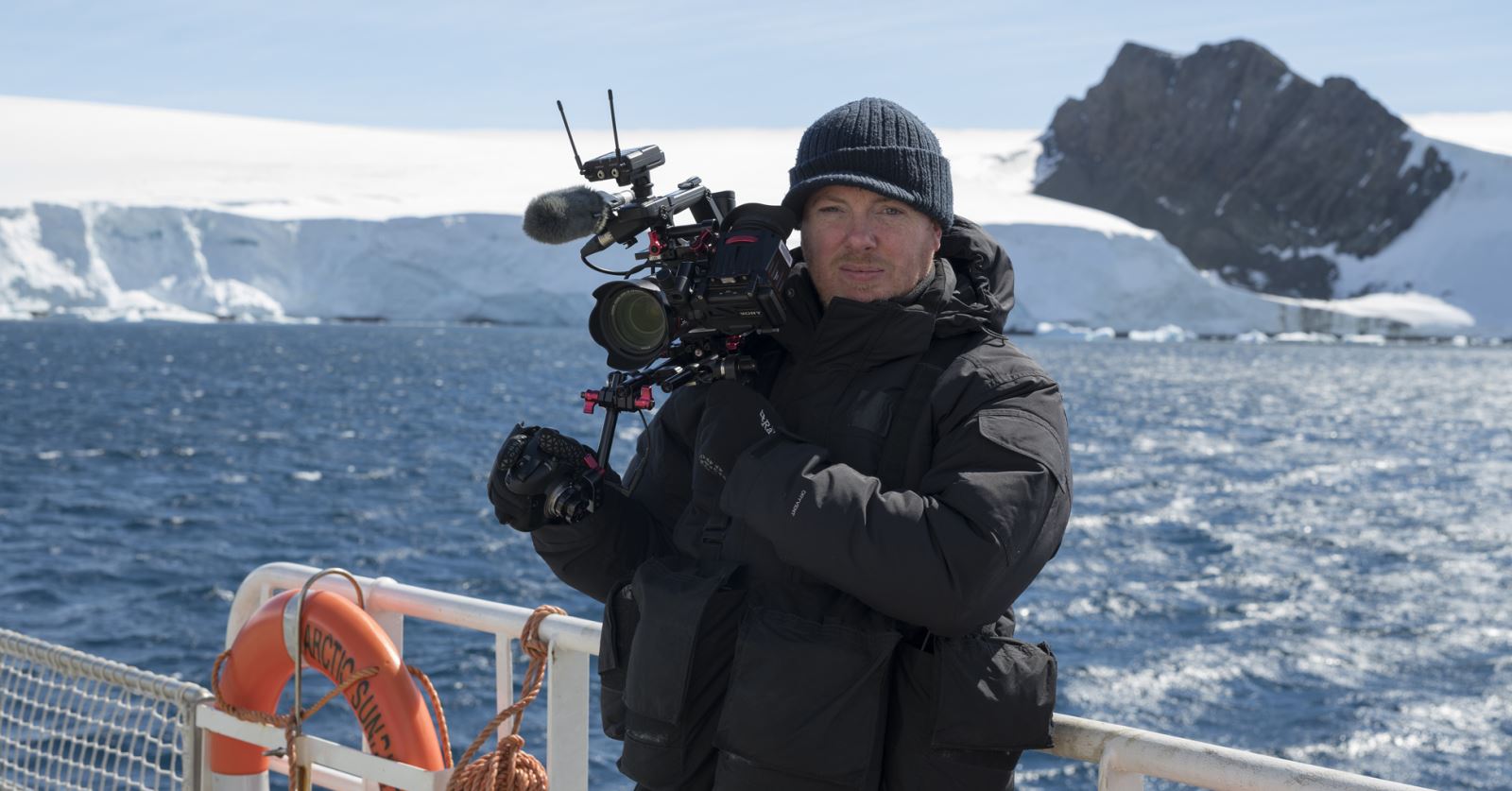 A huge welcome to returning member Robert McKenzie, seen here filming for the BBC in the Antarctic.